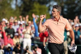 Justin Rose reacts after holing a birdie putt at the 18th hole in the final round of the 2025 Masters Tournament at Augusta National Golf Club 