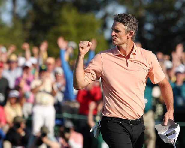 Justin Rose reacts after holing a birdie putt at the 18th hole in the final round of the 2025 Masters Tournament at Augusta National Golf Club 
