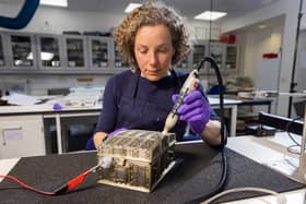 Conservator Diana de Bellaigue removes tarnish from the Mary, Queen of Scots casket. Copyright Duncan McGlynn