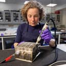 Conservator Diana de Bellaigue removes tarnish from the Mary, Queen of Scots casket. Copyright Duncan McGlynn