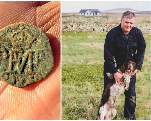 Donald MacPhee, a crofter and keen metal detectorist from Benbecula with his dog, Fergus, and the Mary Queen of Scots coin he found on his croft recently 