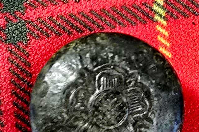 The Jacobite rose button found by Mr MacPhee on Benbecula, said to have likely been worn by someone showing their support for the Stewarts during the Jacobite uprisings. 