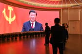 China's President Xi Jinping looms large over visitors to the Museum of the First National Congress of the Chinese Communist Party in Shanghai (Picture: Hector Retamal)