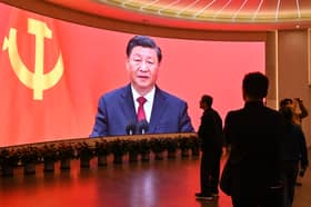 China's President Xi Jinping looms large over visitors to the Museum of the First National Congress of the Chinese Communist Party in Shanghai (Picture: Hector Retamal)