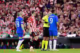 Rangers striker Cyriel Dessers is booked against Bilbao.