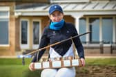 Grace Crawford poses with the trophy after her 2022 win in the Helen Holm Scottish Women's Open at Royal Troon 
