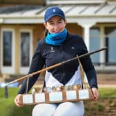 Grace Crawford poses with the trophy after her 2022 win in the Helen Holm Scottish Women's Open at Royal Troon 