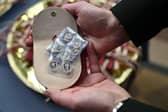 Maundy coins being handed out in 2024.