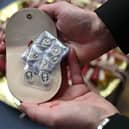 Maundy coins being handed out in 2024.