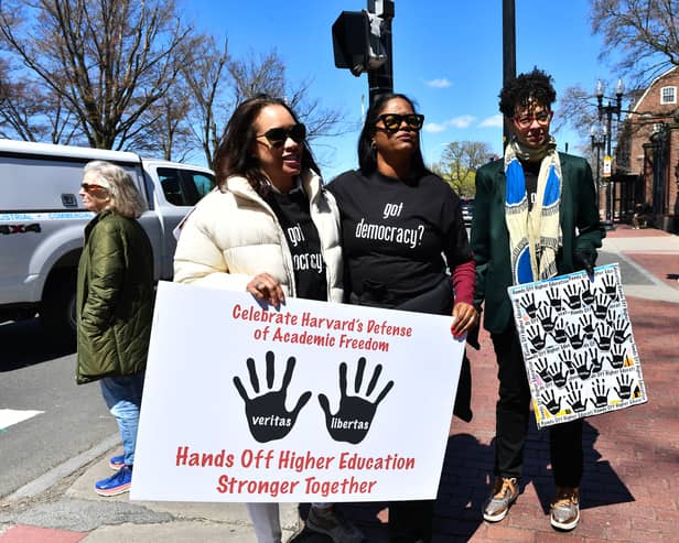 Demonstrators protest against Donald Trump's attacks on Harvard University in Cambridge, Massachusetts (Picture: Joseph Prezioso)