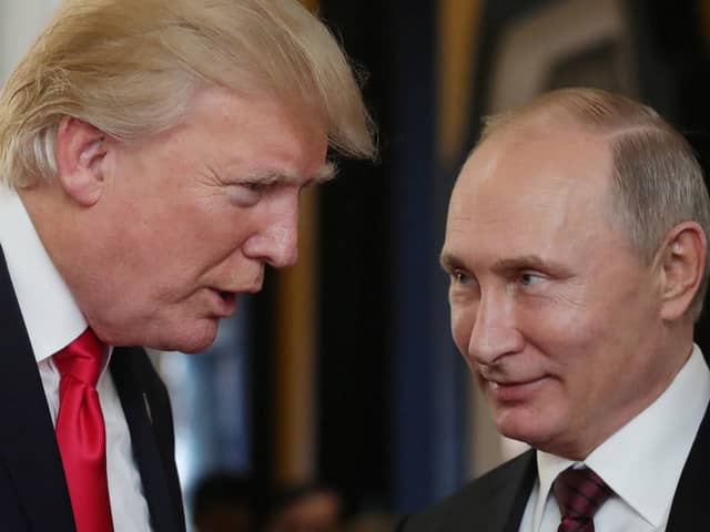 Donald Trump pictured with Vladimir Putin in 2017 during the US President's first term of office (Picture: Mikhail Klimentyev)