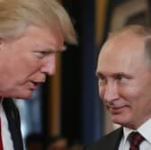 Donald Trump pictured with Vladimir Putin in 2017 during the US President's first term of office (Picture: Mikhail Klimentyev)