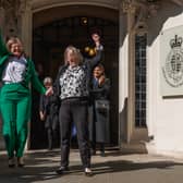 Susan Smith, left, and Marion Calder, directors of campaign group For Women Scotland cheer after the Supreme Court ruled "the terms 'woman' and 'sex' in the Equality Act 2010 refer to a biological woman and biological sex" (Picture: Dan Kitwood)