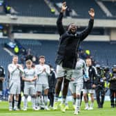 Shayden Morris leads the Aberdeen celebrations at Hampden.