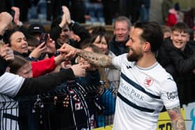 Dylan Easton celebrates with the Raith Rovers fans.