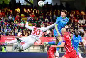 Scott McTominay heads home the winner for Napoli against Monza.