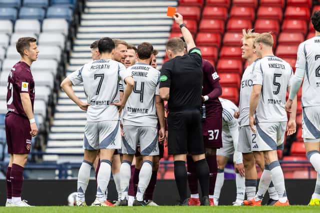 Referee John Beaton sends off Cammy Devlin at Hampden.