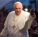 Pope Francis waves to the crowd on his way to World Youth Day celebrations in Rio de Janeiro, Brazil, in 2013 (Picture: Buda Mendes)