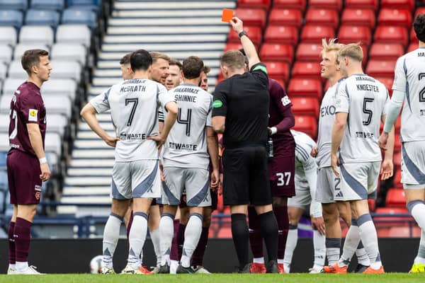Referee John Beaton sent off Hearts' Cammy Devlin during the Scottish Cup semi-final against Aberdeen.