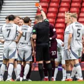 Referee John Beaton sent off Hearts' Cammy Devlin during the Scottish Cup semi-final against Aberdeen.