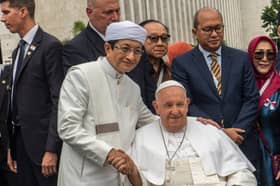 Pope Francis and Grand Imam Nasaruddin Umar shake hands outside the Istiqlal Mosque in Jakarta, Indonesia, in September (Picture: Oscar Siagian)