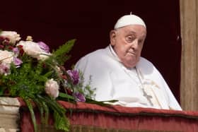 Pope Francis appears on the central lodge of St. Peter's Basilica yesterday (April 20) to bestow the Urbi et Orbi (Latin for to the city and the world) blessing at the end of the Easter mass.