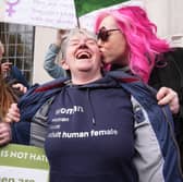 Campaigners for For Women Scotland (FWS) celebrate outside the Supreme Court in London