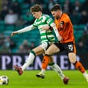 Celtic's Arne Engels (L) and Dundee United's Glenn Middleton in action during a Scottish Premiership match between Celtic and Dundee United earlier this season. Cr: SNS Group.