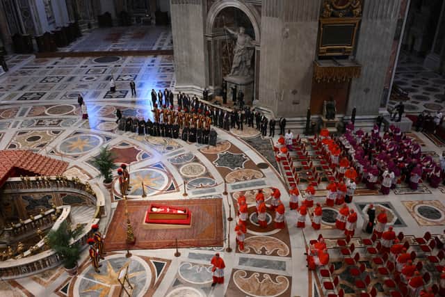 The body of Pope Francis is carried into St. Peter's Basilica at the Vatican. Picture: Alessandro Di Meo/ Pool Photo via AP