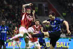 Inter Milan's Matteo Darmian (right) is blocked by AC Milan's Kyle Walker during the Coppa Italia semi-final first leg. (Photo by ISABELLA BONOTTO/AFP via Getty Images)          