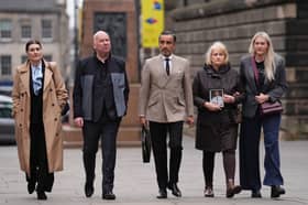 The family of Calum Inglis, including father Alan (second left) mother Jen (second right), sister Frances Marr alongside lawyer Aamer Anwar outside the Crown Office in Edinburgh after meeting Lord Advocate Dorothy Bain KC