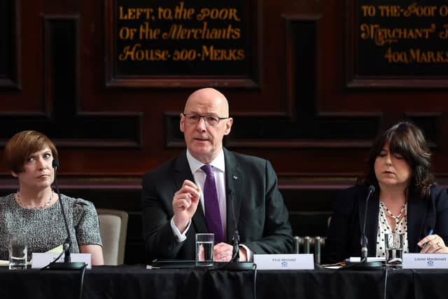 First Minister John Swinney speaking at Merchants House of Glasgow