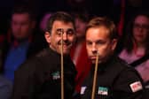 Ronnie O'Sullivan and Ali Carter will finish their first round match today.