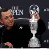Xander Schauffele gazes at the Claret Jug after his victory in the 152nd Open at Royal Troon 