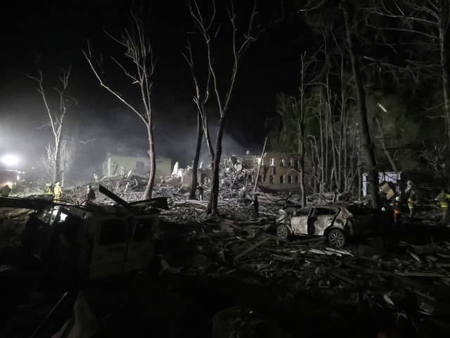 The aftermath of a 'massive' Russian missile strike on a residential area of Ukrainian capital Kyiv