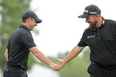 Rory McIlroy and Shane Lowry interact during the first round of the Zurich Classic of New Orleans in Avondale, Louisiana