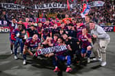 Lewis Ferguson (centre) celebrates with his Bologna teammates and supporters after his side's Coppa Italia semi-final win over Empoli at Renato Dall'Ara Stadium. (Photo by Alessandro Sabattini/Getty Images)