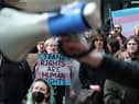 Supporters of trans rights hold a rally in Edinburgh following the Supreme Court ruling about the definition of a woman (Picture: Jeff J Mitchell)