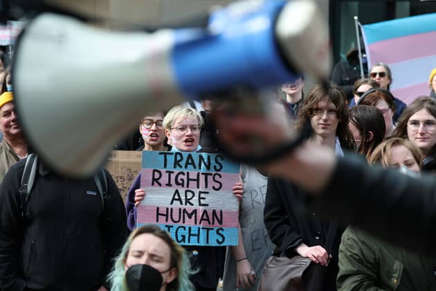 Supporters of trans rights hold a rally in Edinburgh following the Supreme Court ruling about the definition of a woman (Picture: Jeff J Mitchell)