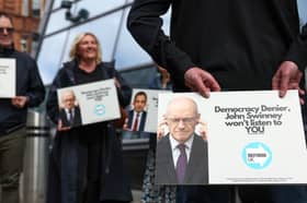 Reform UK activists protest outside the Merchants House of Glasgow where John Swinney convened an 'anti-far-right' summit on Wednesday (Picture: Jeff J Mitchell)