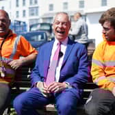 Reform UK leader Nigel Farage with supporters during a visit to Ramsgate in Kent, while on the English local election campaign trail