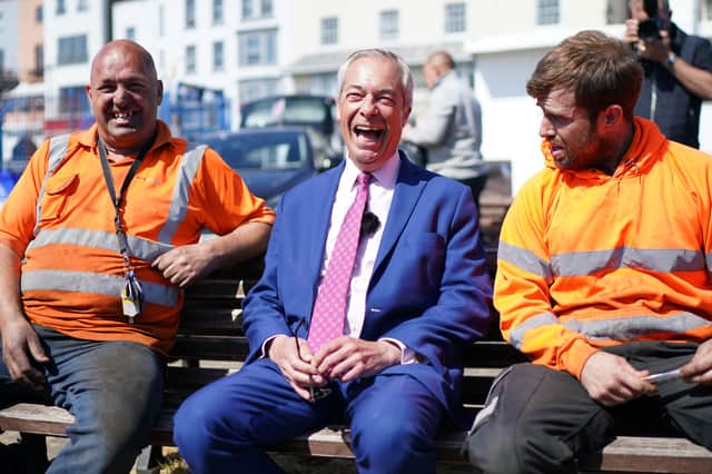 Reform UK leader Nigel Farage with supporters during a visit to Ramsgate in Kent, while on the English local election campaign trail