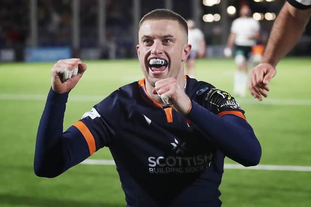 Freddie Owsley celebrates his debut try for Edinburgh against Brive in the EPCR Challenge Cup in 2022.