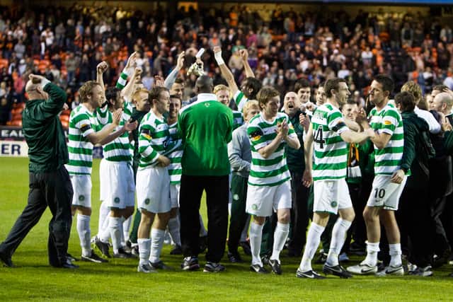 Celtic players celebrate winning the title at Tannadice in 2008 under Gordon Strachan.