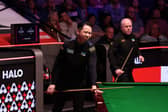 Xiao Guodong and John Higgins will resume their second round match today.