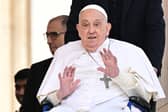 The late Pope Francis greets the crowd during a surprise appearance in St Peter's Square earlier this month (Picture: Tiziana Fabi)