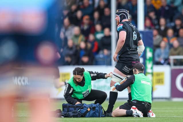 Glasgow Warriors' Gregor Brown receives treatment during a bruising United Rugby Championship match against Vodacom Bulls at Scotstoun.