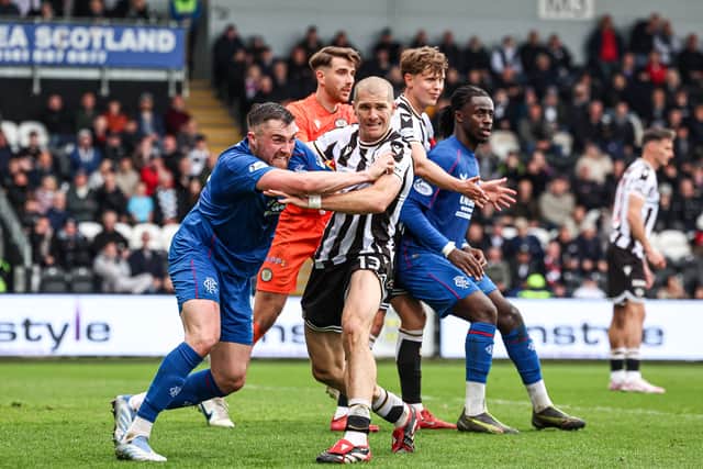 Rangers' John Souttar and St Mirren's Alex Gogic get to grips with things in Paisley last season.