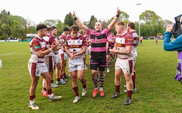 The Ayr squad receive a guard of honour from Watsonians after beating the Edinburgh team in the Arnold Clark Premiership final at Millbrae.