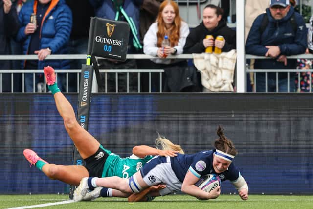 Player of the match Rachel McLachlan scores for Scotland in the 26-19 win over Ireland in the Guinness Women's Six Nations match in Edinburgh.
